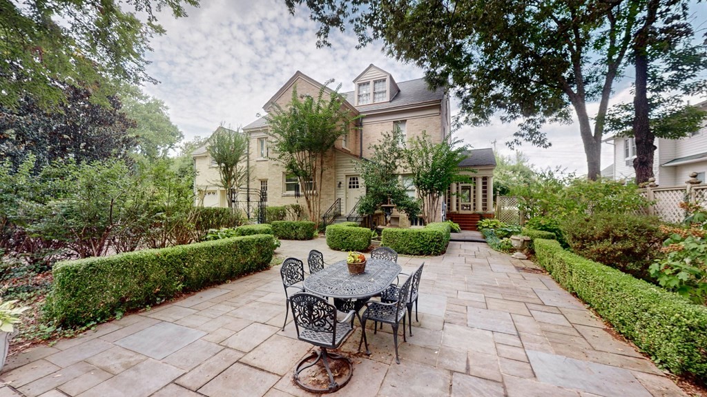 505 Walnut Street Paris, TN 38242 - Photo 49 of 54 a view of a patio with table and chairs and potted plants