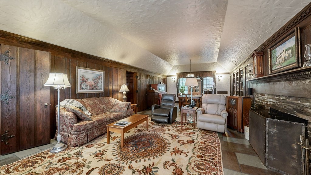 505 Walnut Street Paris, TN 38242 - Photo 9 of 54 a living room with furniture and a fireplace