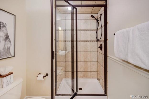 97 Kinney Way, Unit A Winter Park, CO 80482 - Photo 15 of 27 a bathroom with a shower