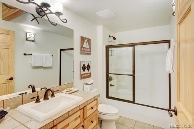 97 Kinney Way, Unit A Winter Park, CO 80482 - Photo 20 of 27 a bathroom with a sink toilet and shower
