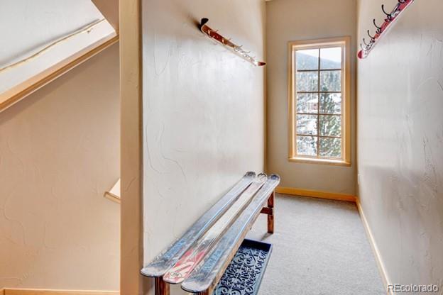 97 Kinney Way, Unit A Winter Park, CO 80482 - Photo 25 of 27 a view of room with window and wooden floor