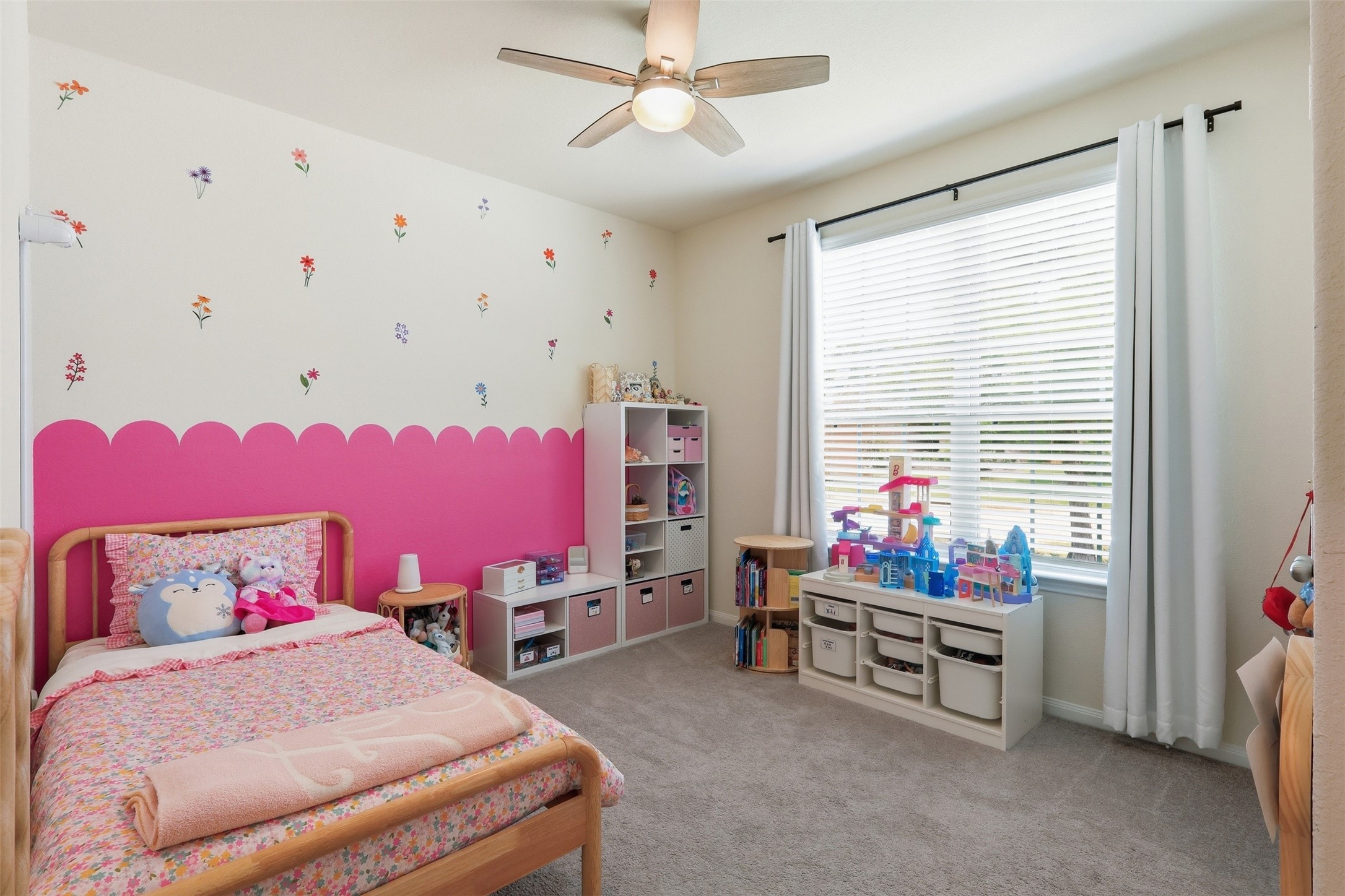 9739 Birdsnest Court Spring, TX 77379 - Photo 20 of 38 Secondary bedroom with natural light and generous closet space.