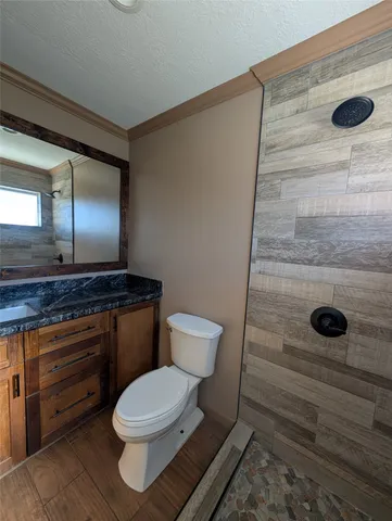 a bathroom with a toilet and a sink