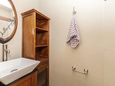 a bathroom with a sink and a mirror