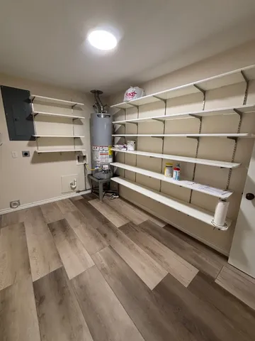 a view of storage and utility room