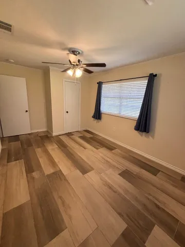 a view of a ceiling fan in a room