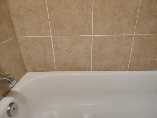 a bathroom with a bathtub