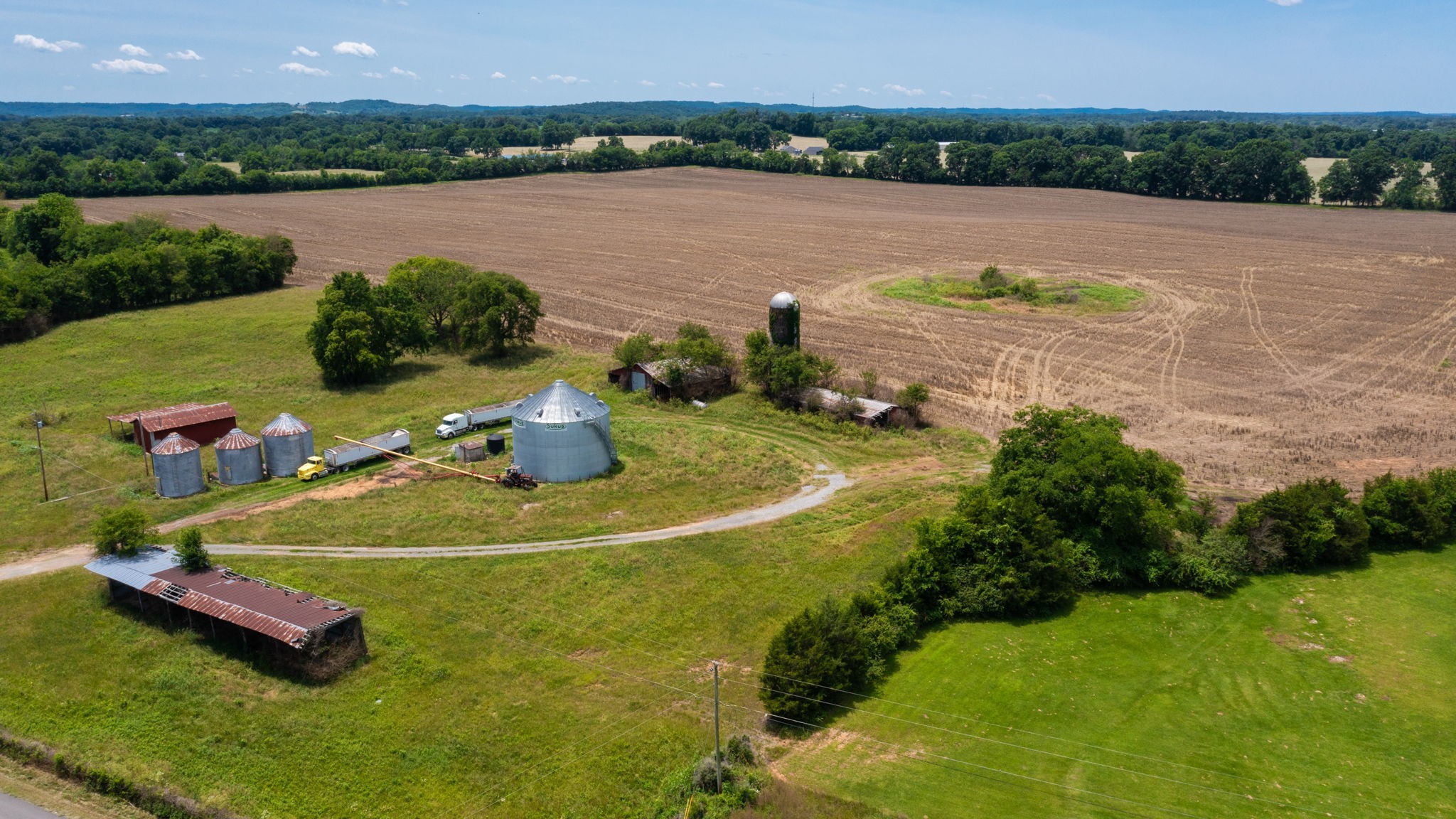 332 Coble Road Shelbyville, TN 37160 - Photo 13 of 30 an aerial view of a house with outdoor space and lake view