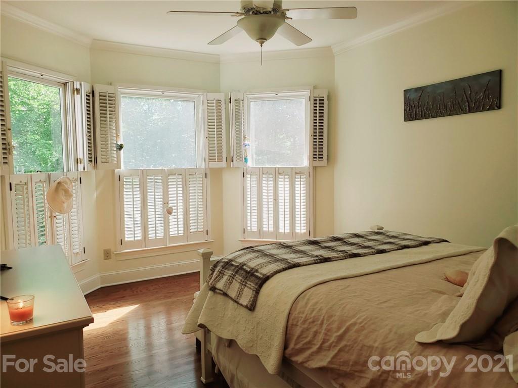 143 Morrison Hill Road Davidson, NC 28036 - Photo 7 of 17 a bedroom with a bed and a window