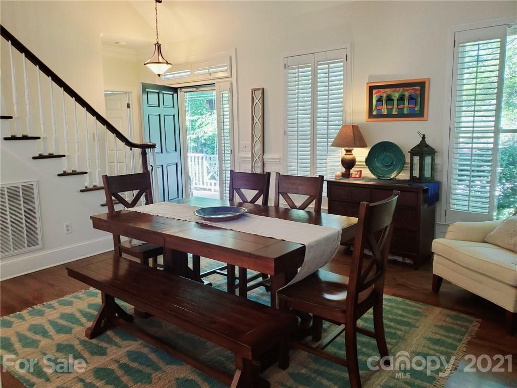 143 Morrison Hill Road Davidson, NC 28036 - Photo 8 of 17 a view of a dining room with furniture window and wooden floor