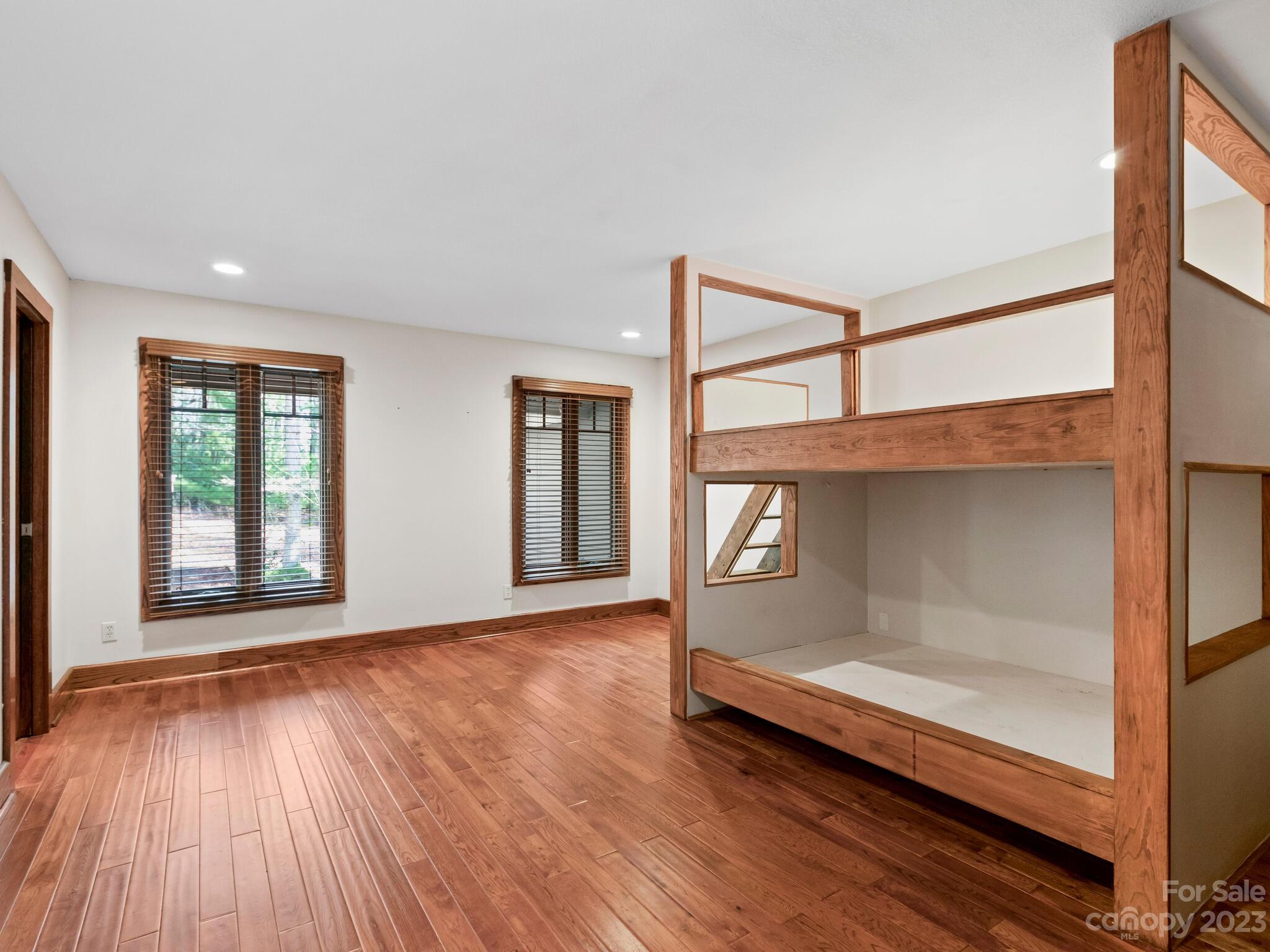 122 Emmas Grove Road Fletcher, NC 28732 - Photo 17 of 48 wooden floor in an empty room with a window