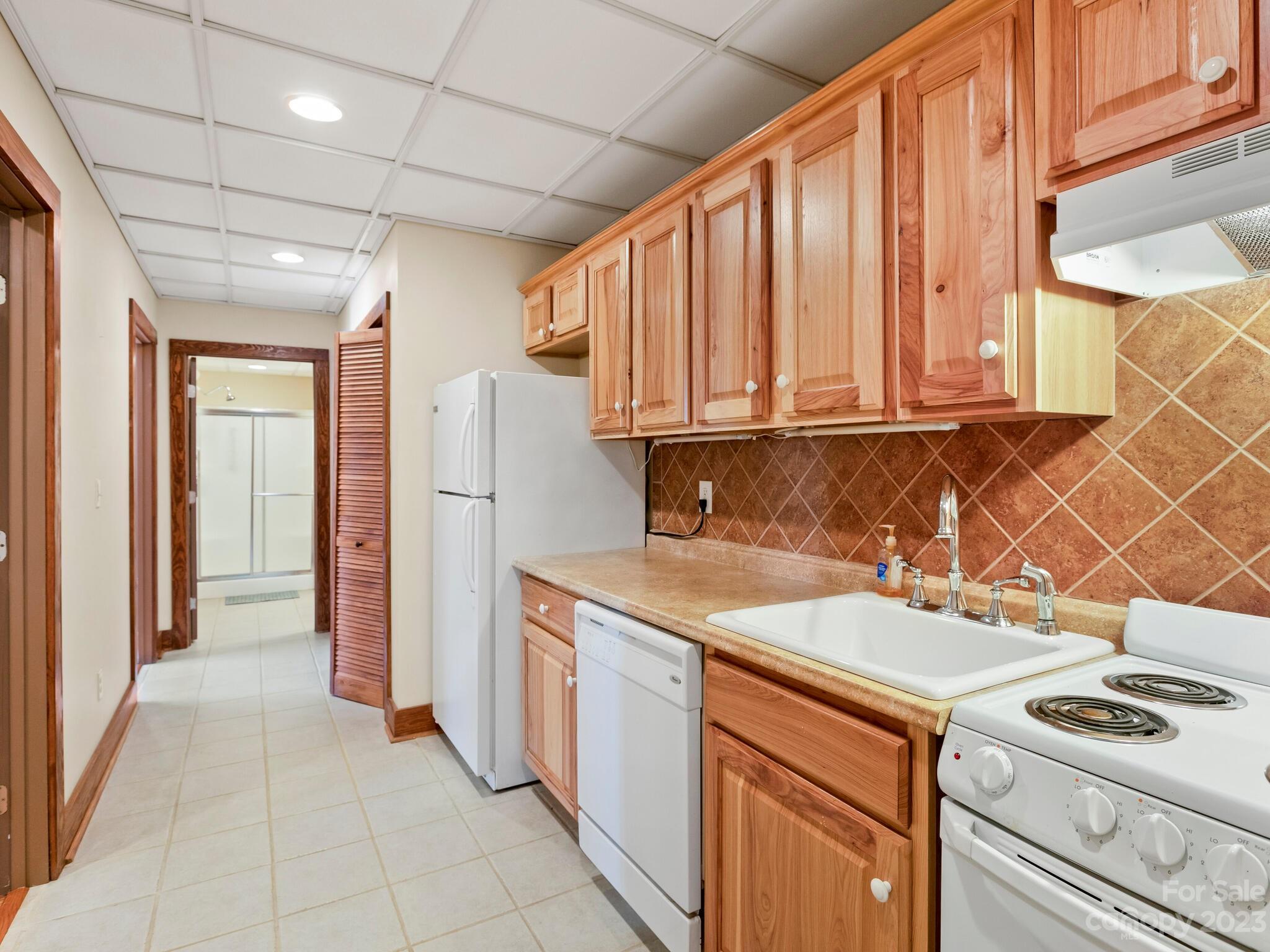 122 Emmas Grove Road Fletcher, NC 28732 - Photo 24 of 48 a utility room with dryer and washer