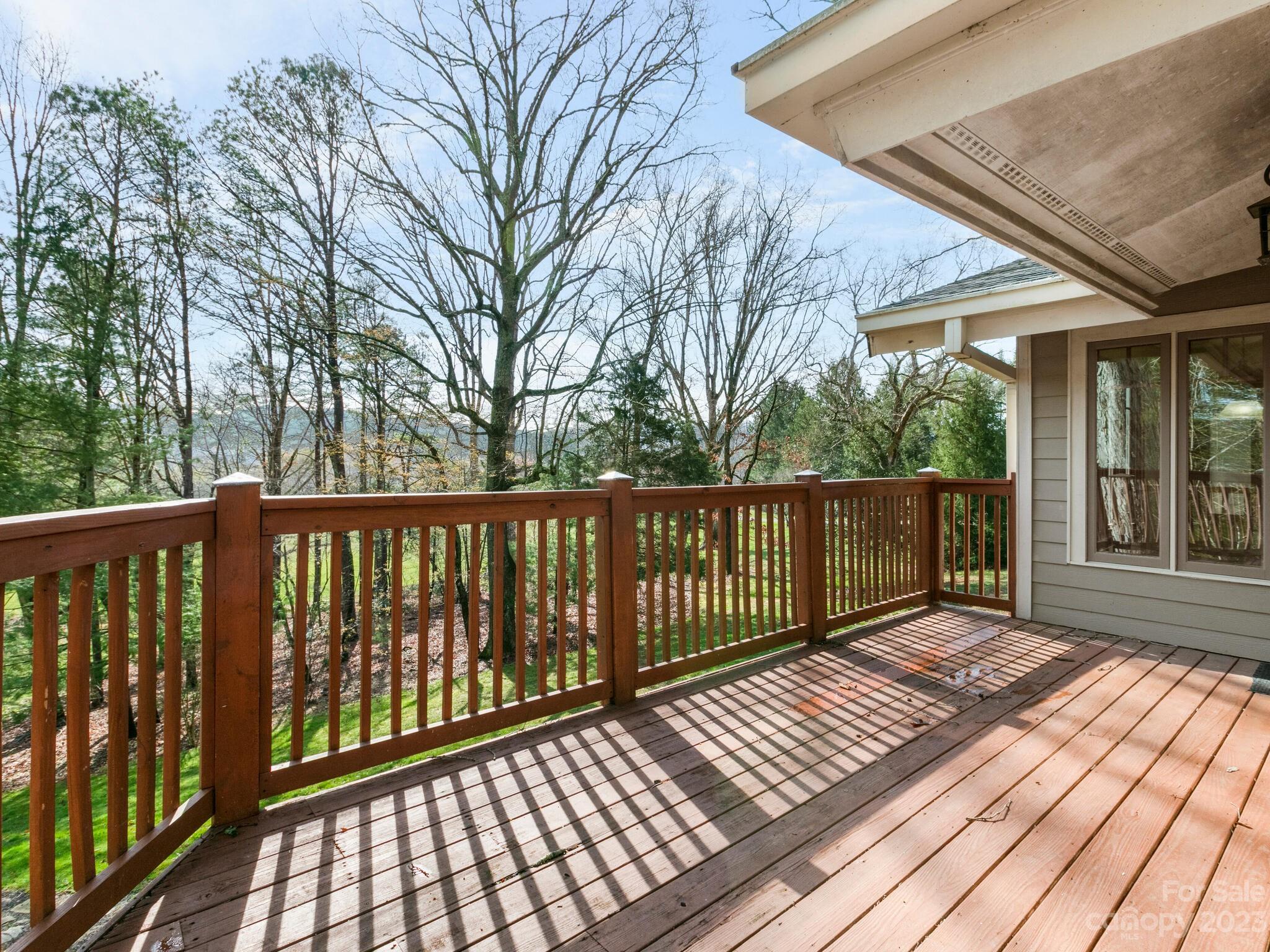 122 Emmas Grove Road Fletcher, NC 28732 - Photo 31 of 48 a view of a wooden roof deck