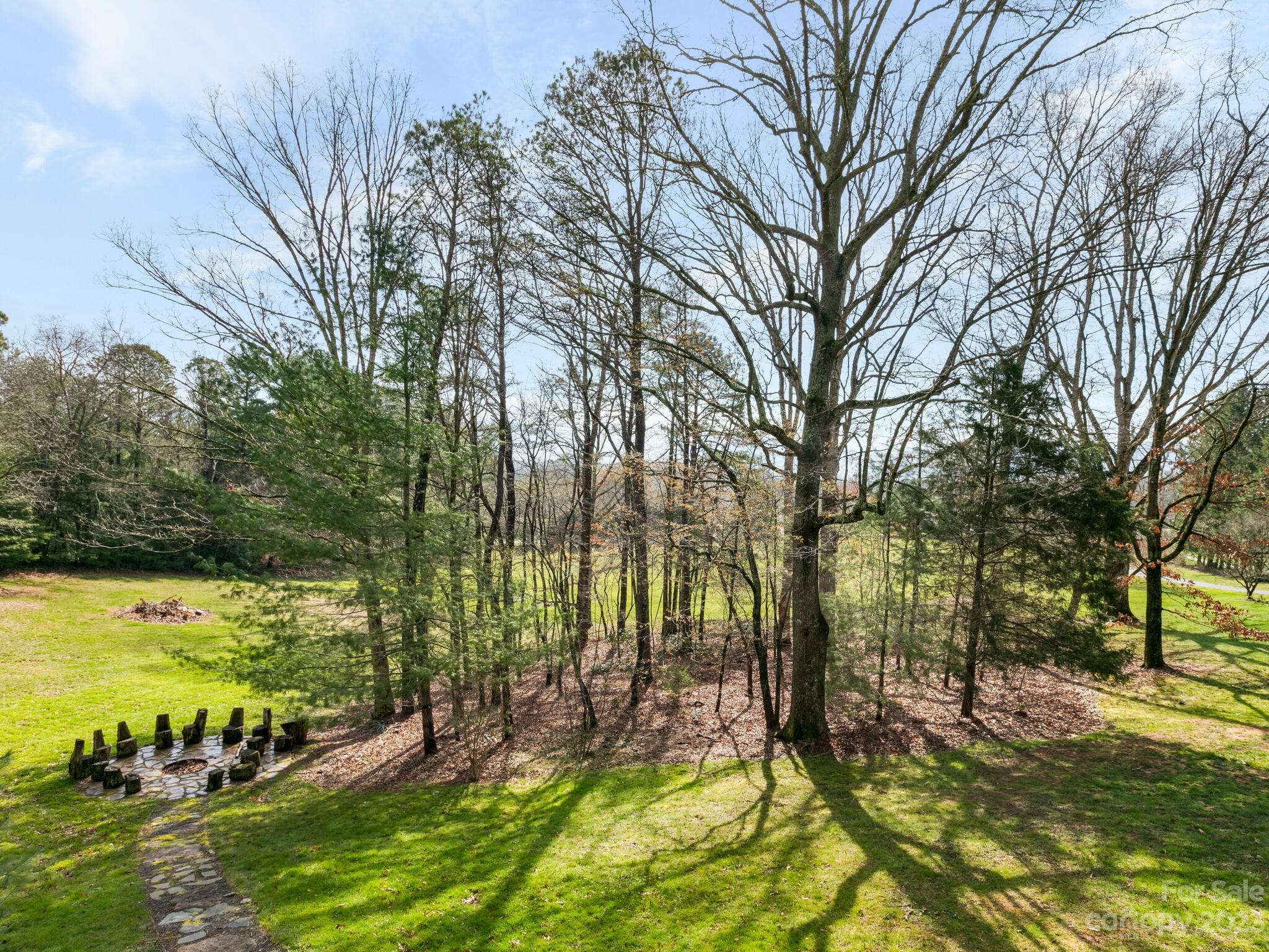 122 Emmas Grove Road Fletcher, NC 28732 - Photo 32 of 48 a view of a large yard