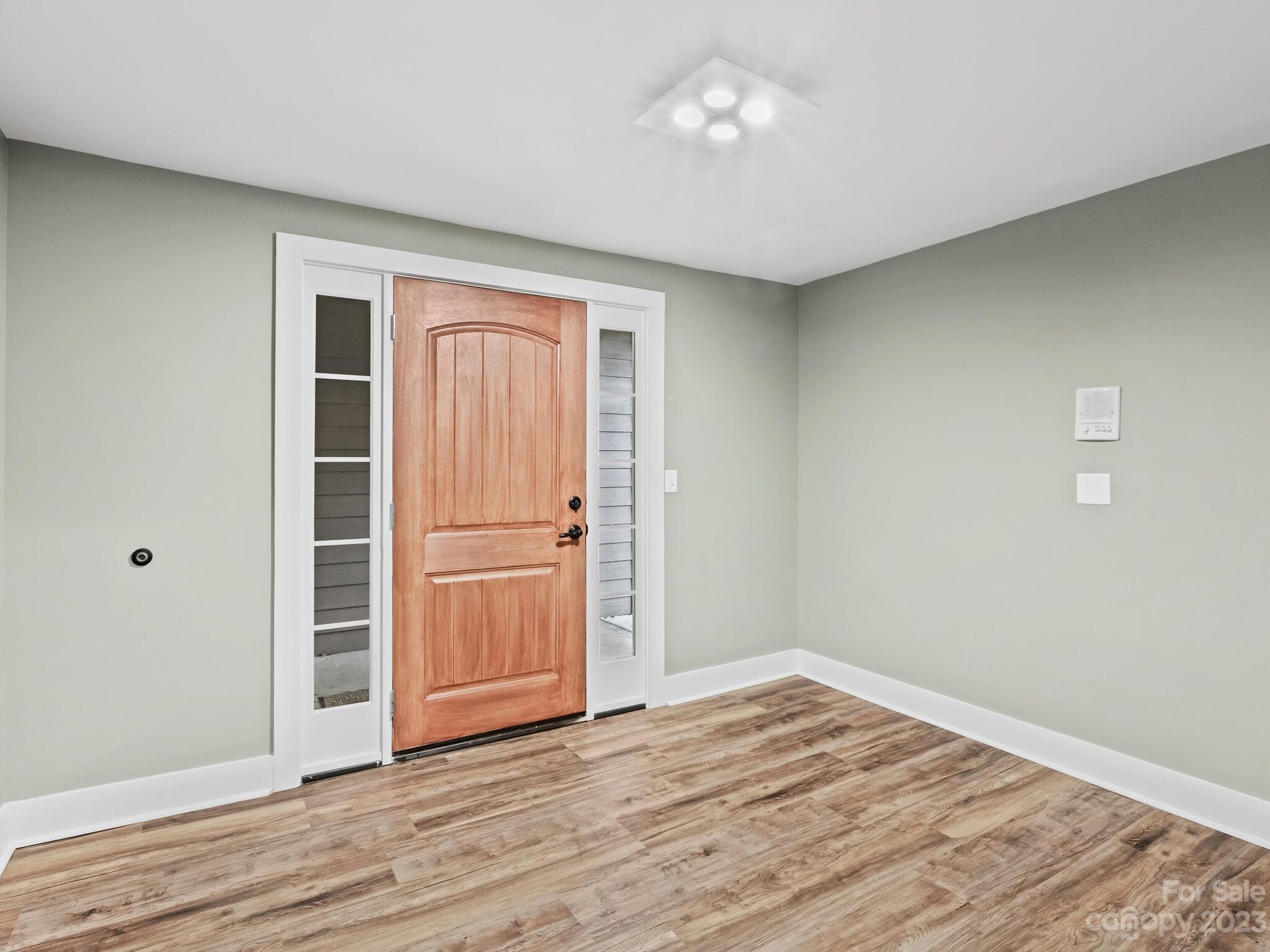 122 Emmas Grove Road Fletcher, NC 28732 - Photo 35 of 48 a view of empty room with wooden floor
