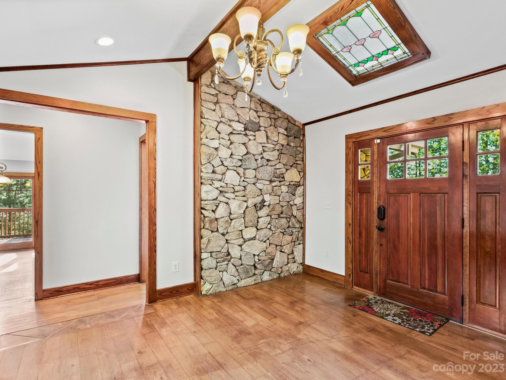 122 Emmas Grove Road Fletcher, NC 28732 - Photo 4 of 48 an empty room with wooden floor and windows