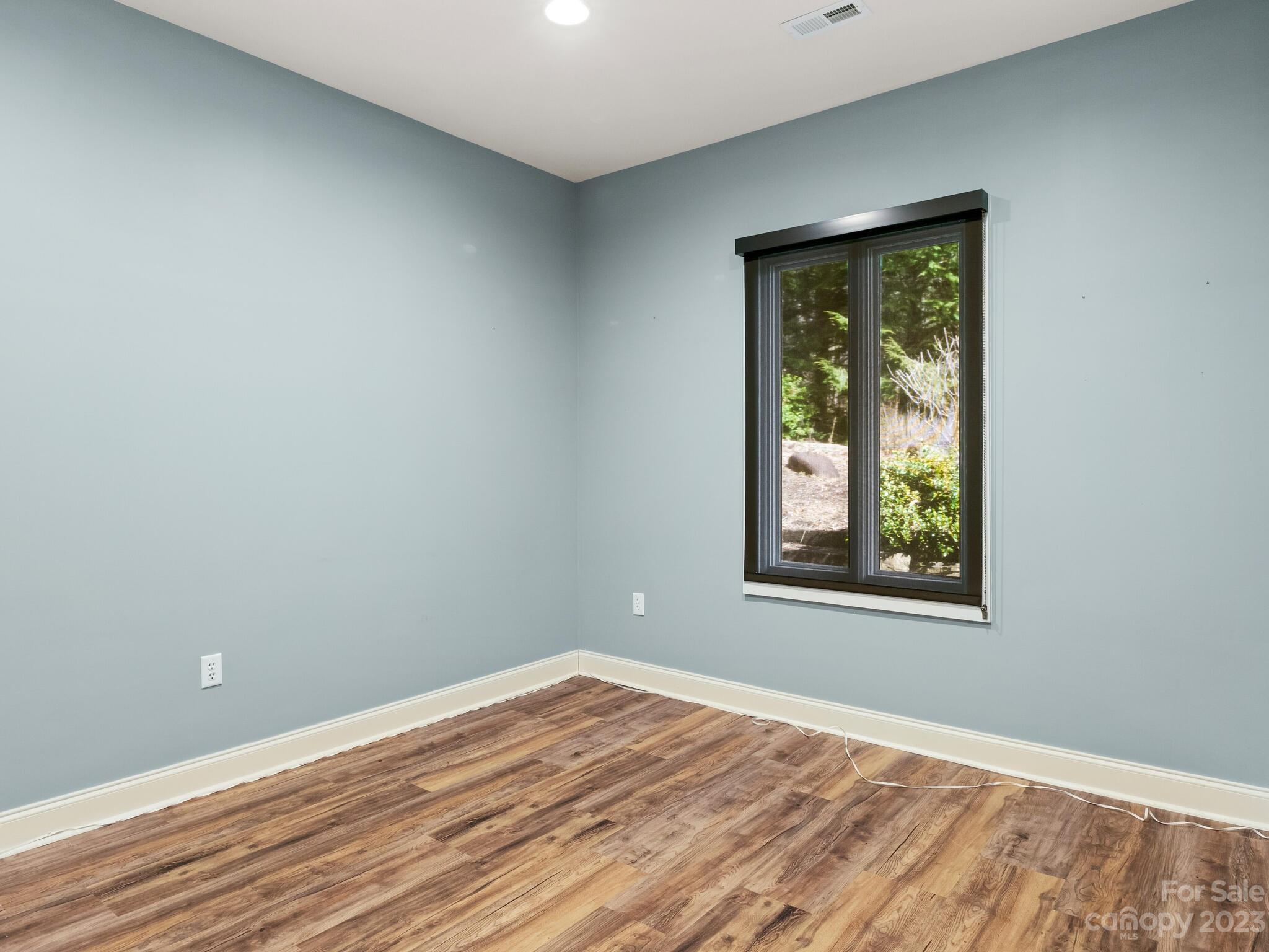 122 Emmas Grove Road Fletcher, NC 28732 - Photo 42 of 48 an empty room with a window
