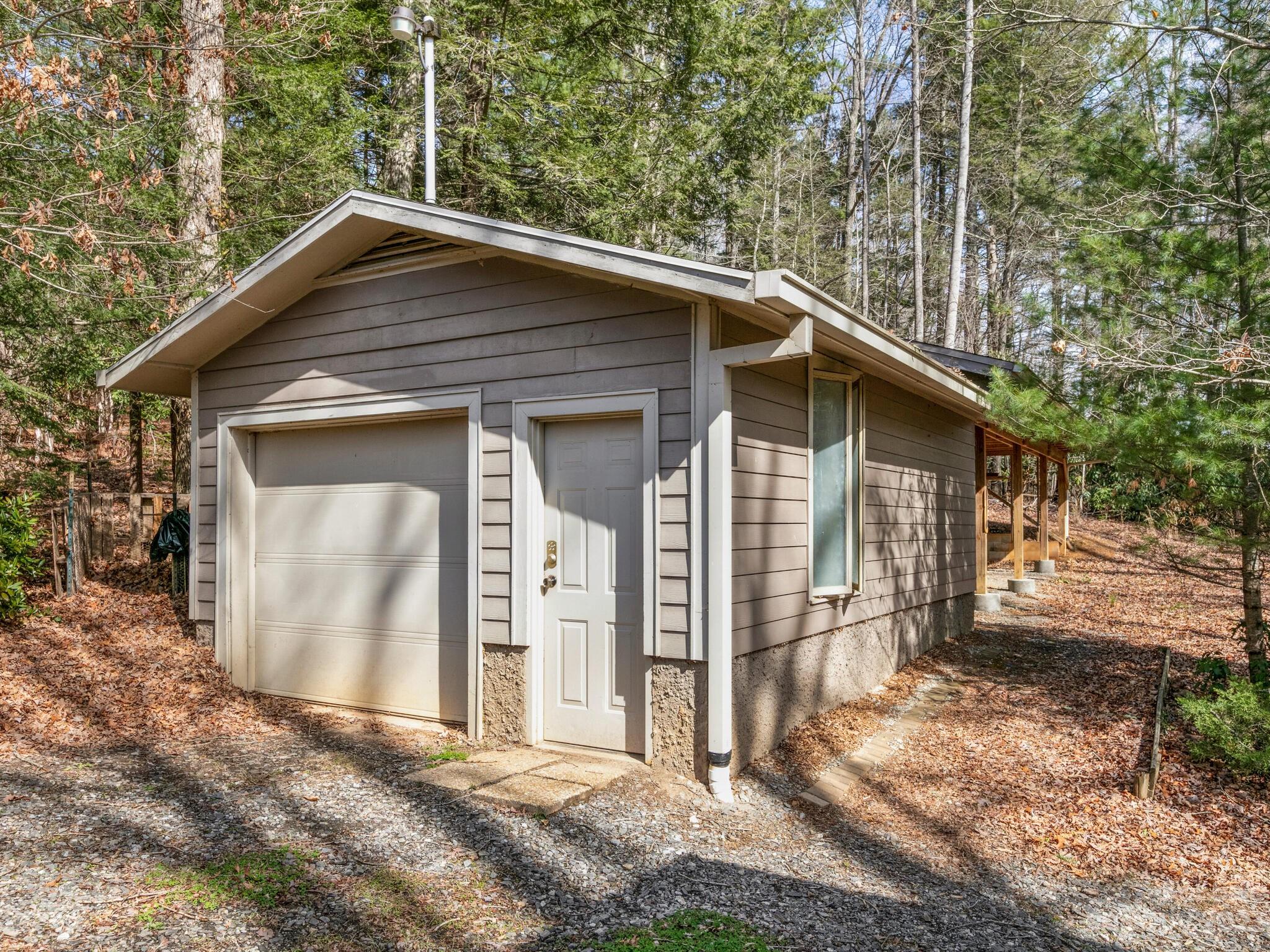 122 Emmas Grove Road Fletcher, NC 28732 - Photo 45 of 48 a front view of a house with a yard