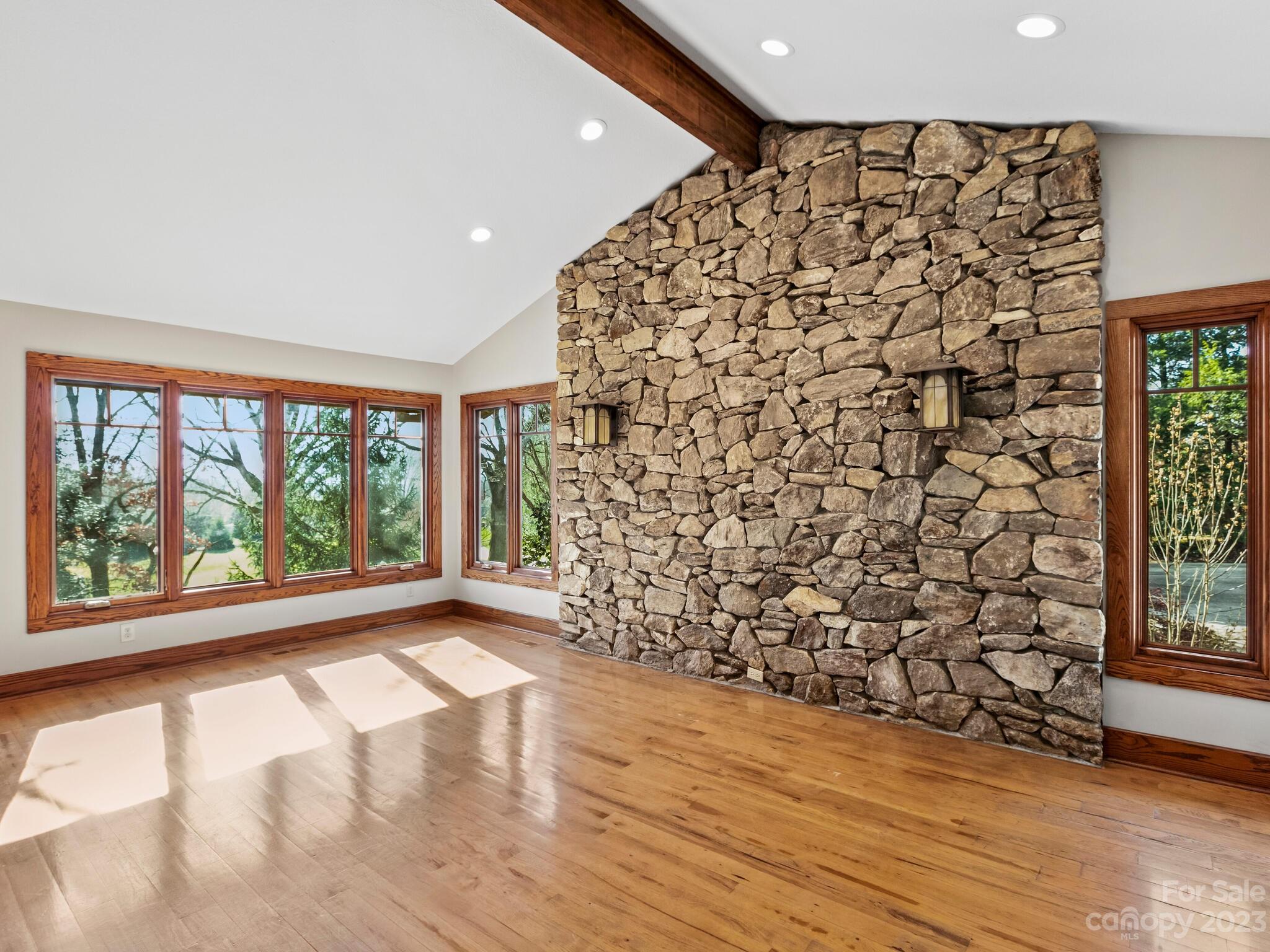 122 Emmas Grove Road Fletcher, NC 28732 - Photo 5 of 48 wooden floor in an empty room with a window