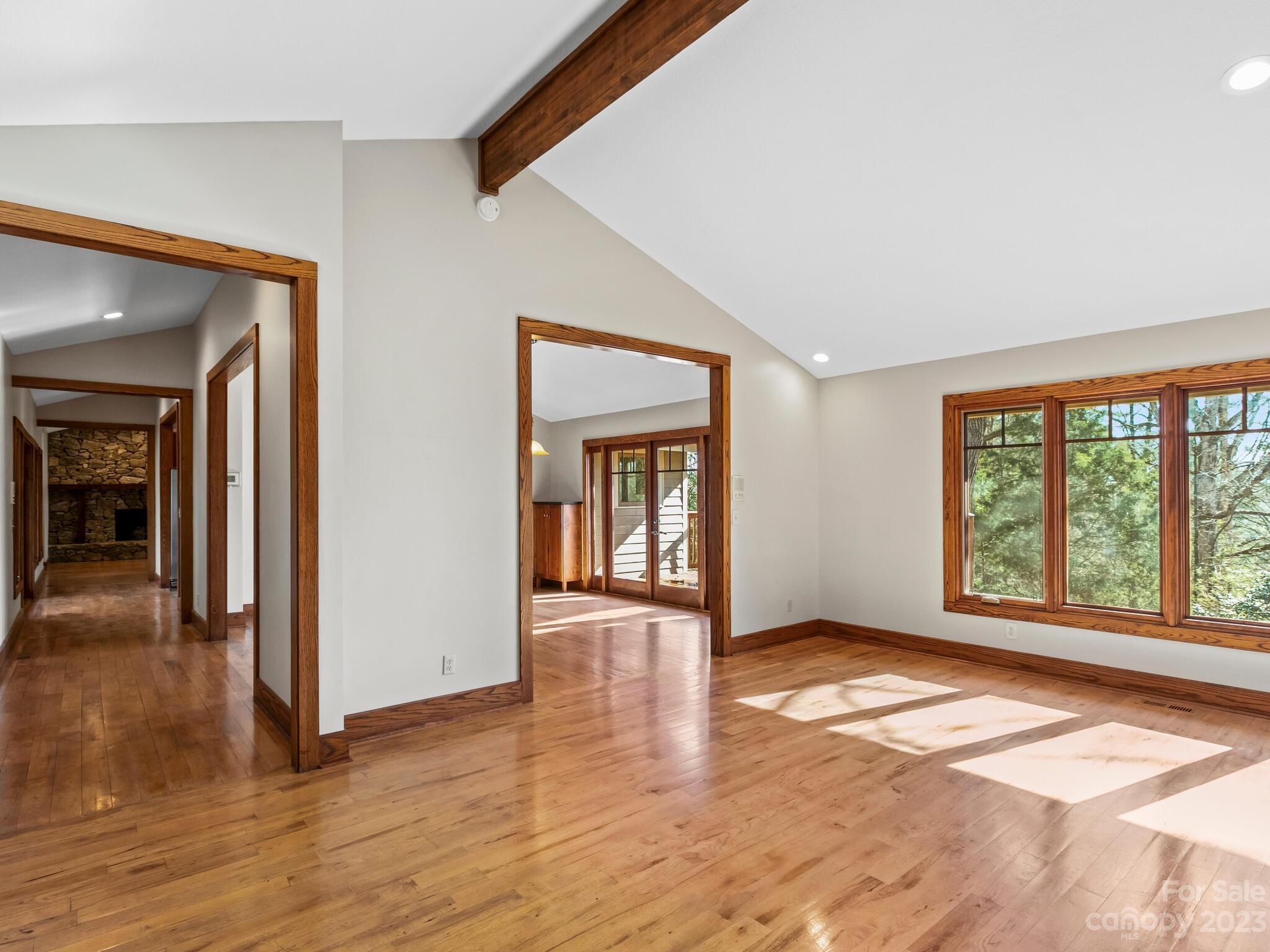 122 Emmas Grove Road Fletcher, NC 28732 - Photo 6 of 48 a view of a room with wooden floor and a window