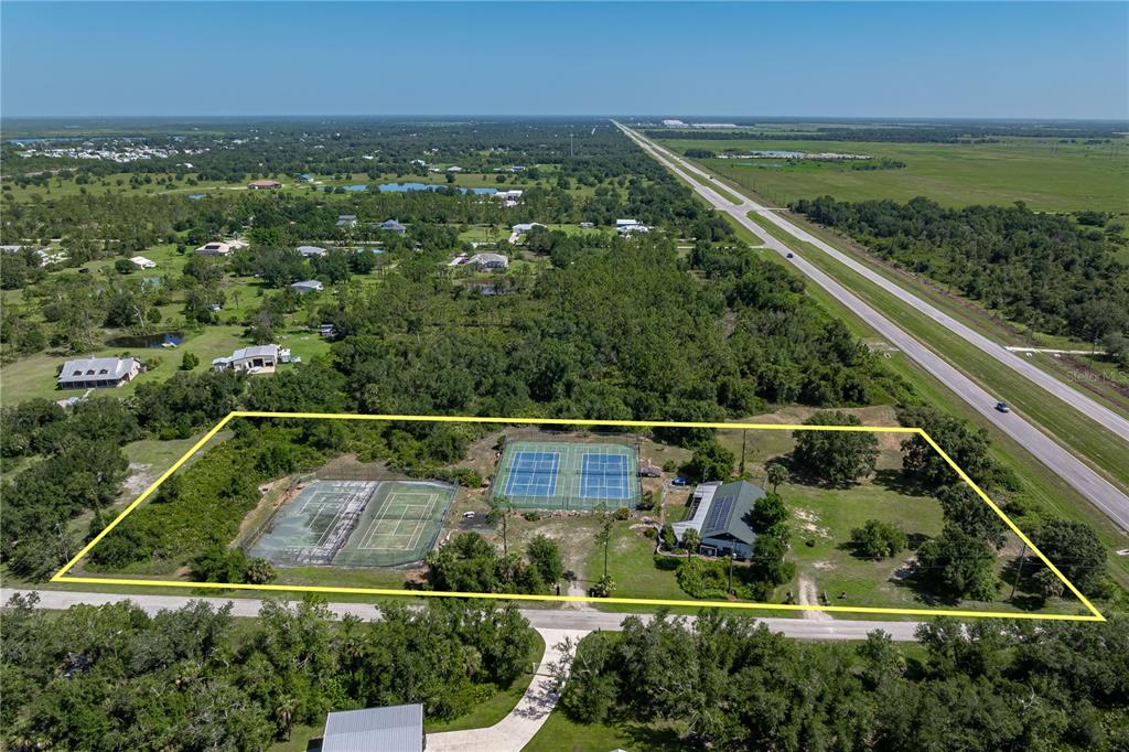 an aerial view of a tennis court
