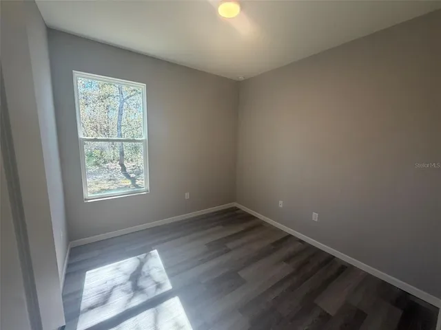 a bathroom with a sink a toilet and bathtub