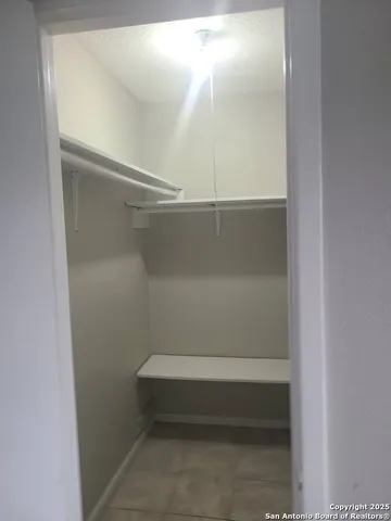a bathroom with a sink toilet and mirror