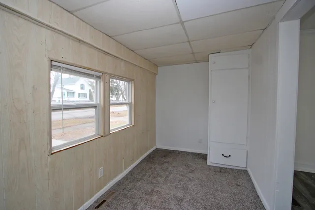 an empty room with windows