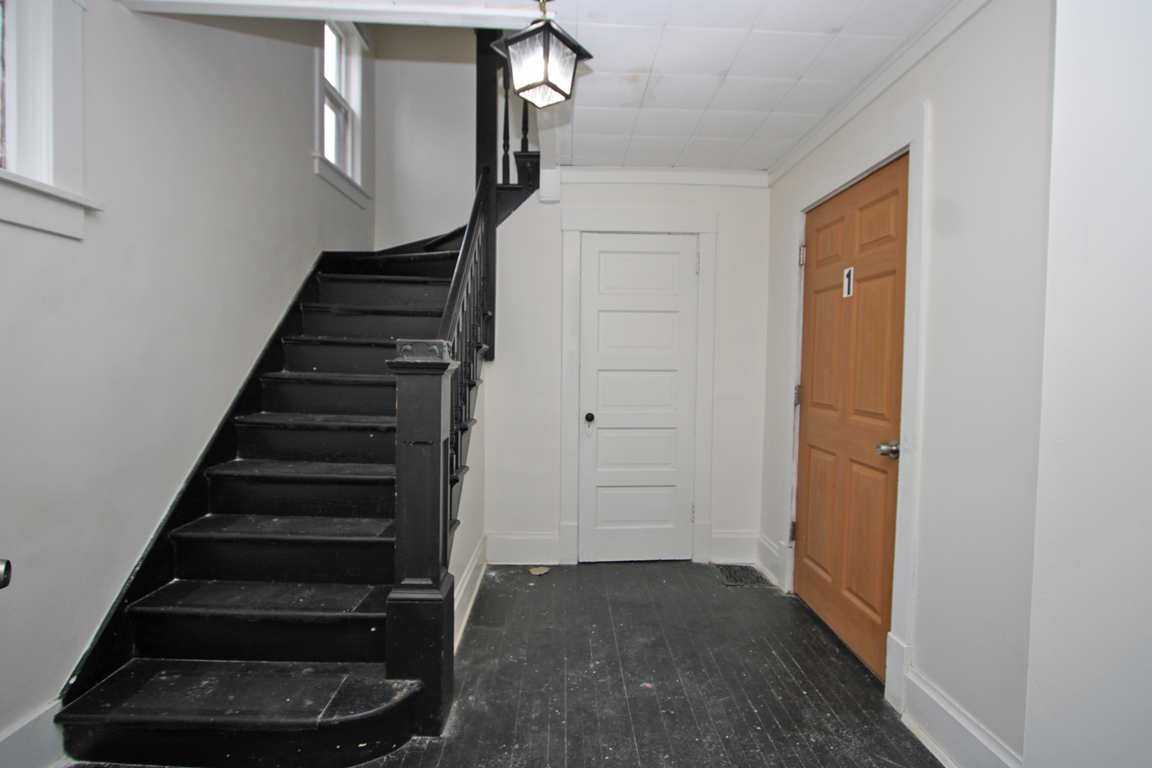 3013 Elim Avenue Zion, IL 60099 - Photo 4 of 36 a view of entryway and hall with wooden floor