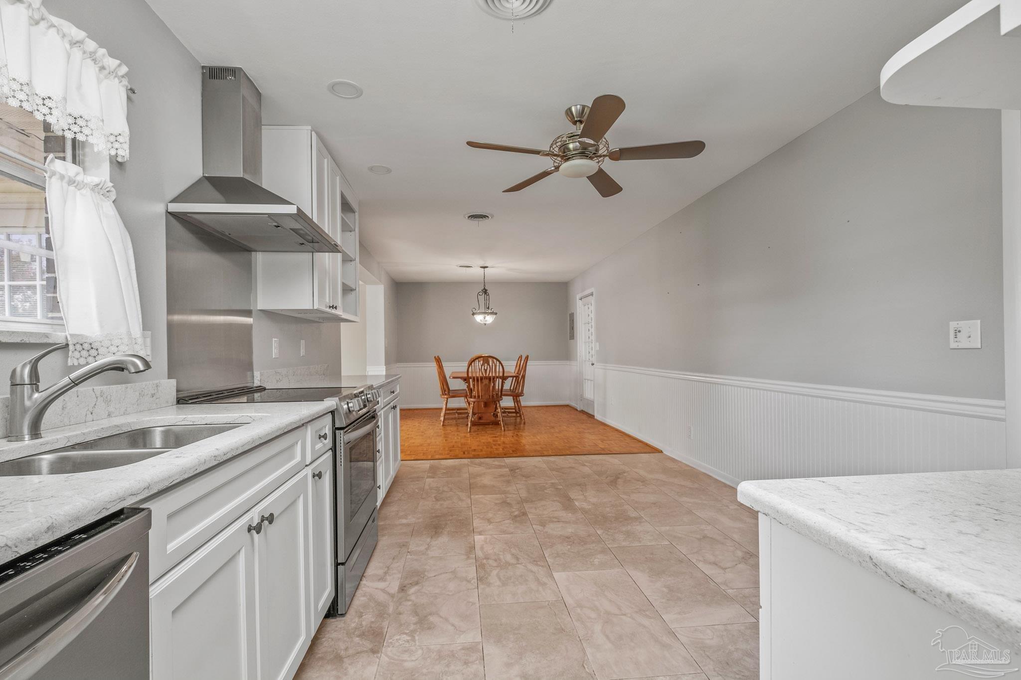 6161 Azalea Road Pensacola, FL 32504 - Photo 9 of 37 Easy access to dining area and family room
