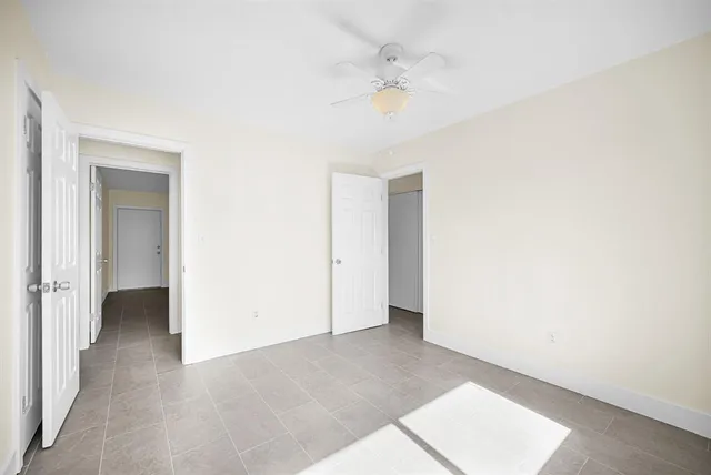 an empty room with a bathroom