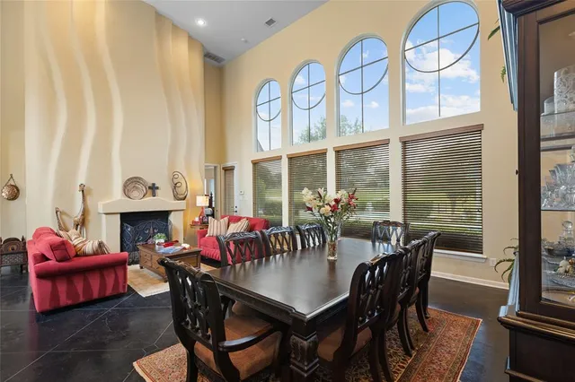 a view of a dining room with furniture window and outside view