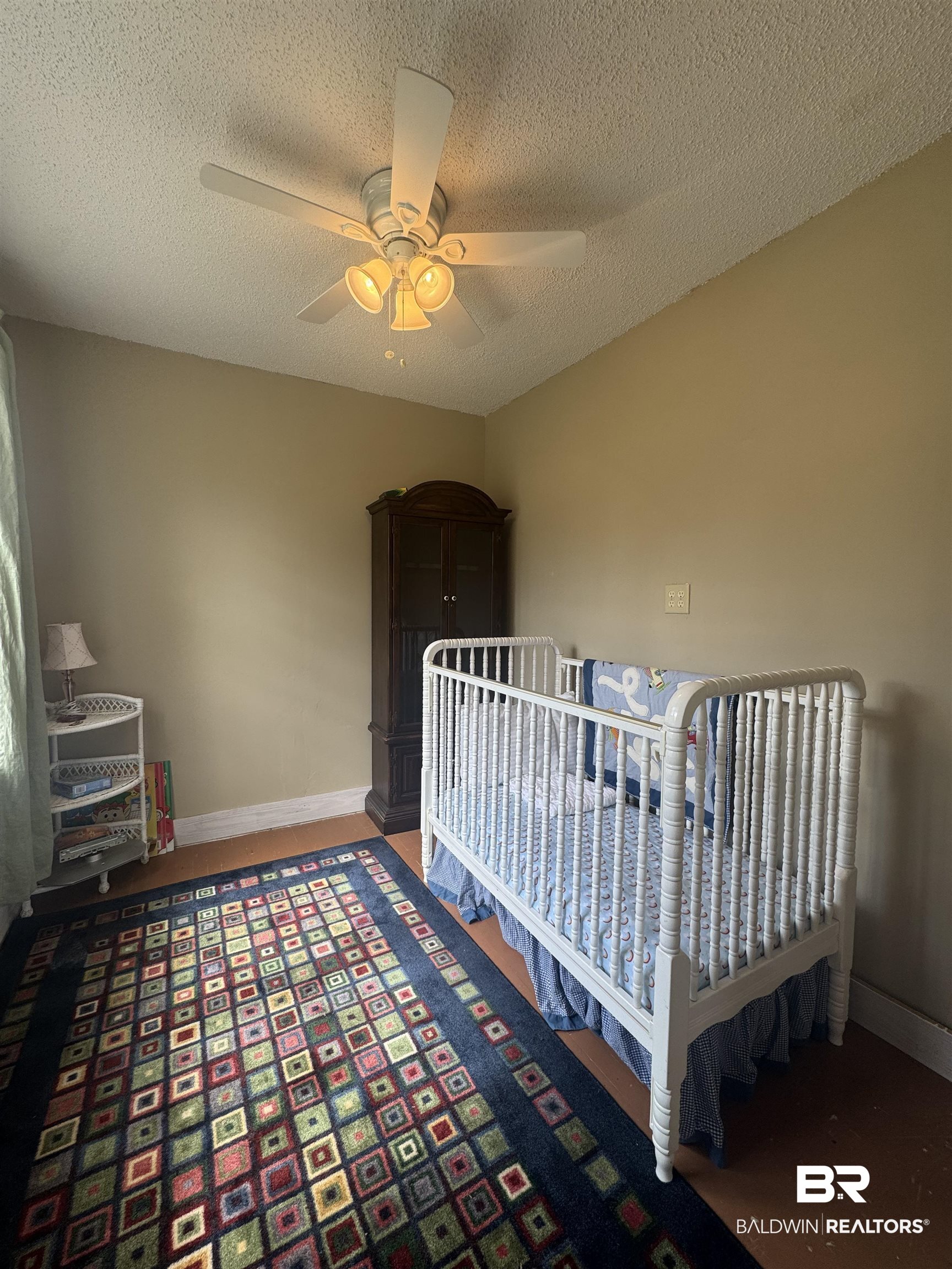 275 Thames Road Frisco City, AL 36445 - Photo 24 of 24 Bedroom featuring ceiling fan, a textured ceiling, and baseboards
