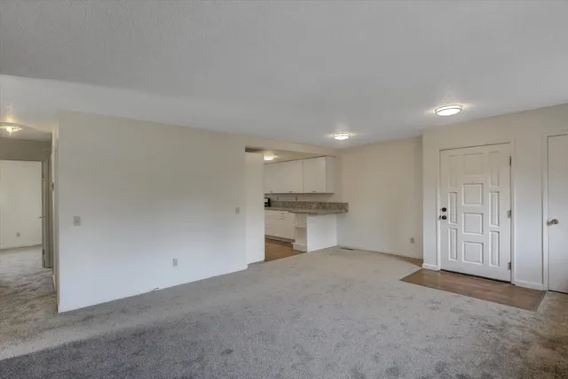 a kitchen with a sink stainless steel appliances and cabinets
