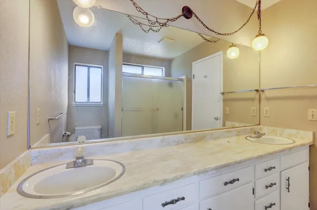 a view of a balcony with wooden floor and outdoor space