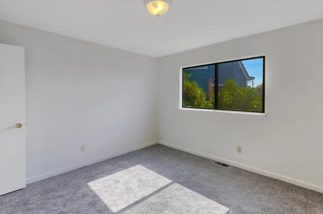 a view of backyard with deck and deck