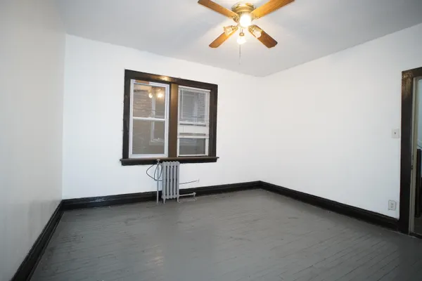 an empty room with windows