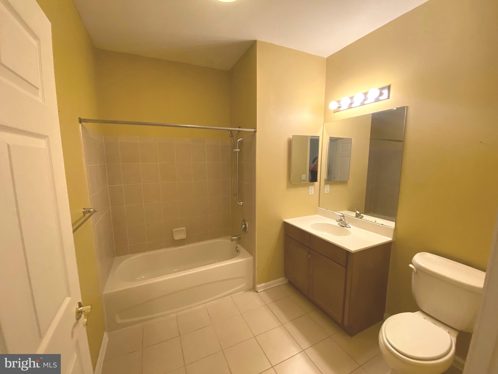 326 Masterson Court Ewing, NJ 08618 - Photo 11 of 17 a bathroom with a sink a toilet and shower