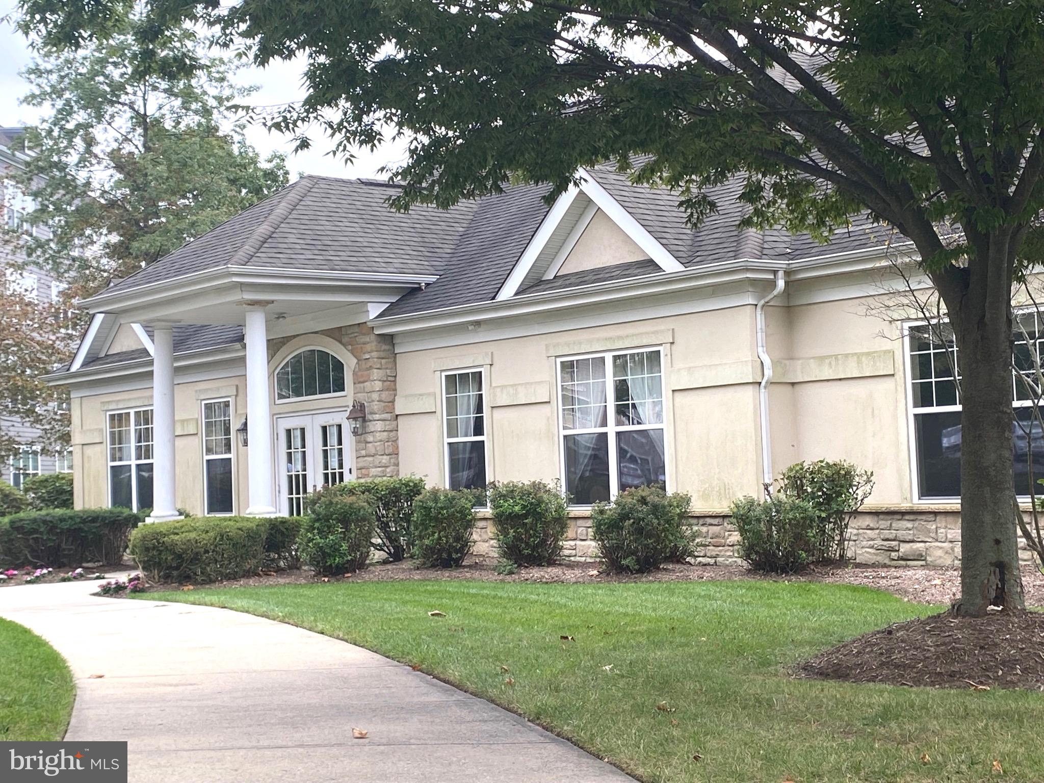 326 Masterson Court Ewing, NJ 08618 - Photo 16 of 17 a front view of a house with a yard
