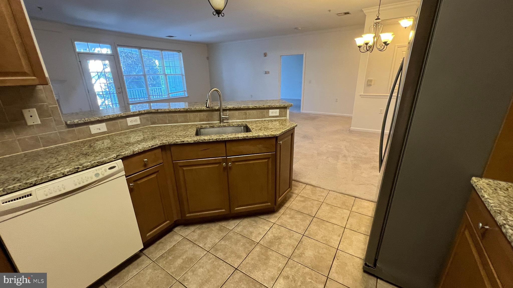 326 Masterson Court Ewing, NJ 08618 - Photo 4 of 17 a bathroom with a sink a vanity and a mirror