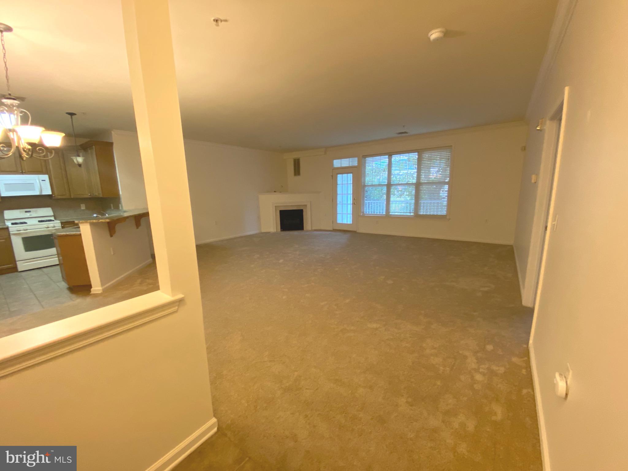 326 Masterson Court Ewing, NJ 08618 - Photo 5 of 17 view of an empty room with glass door
