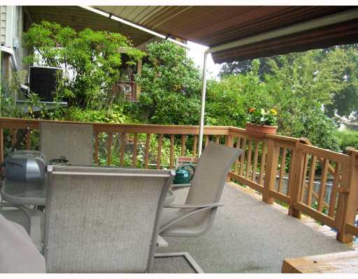 91 Oakwood Road Pittsburgh, PA 15205 - Photo 11 of 13 Exterior Back. The spacious rear deck is covered by an awning.