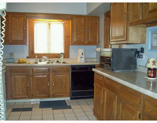 91 Oakwood Road Pittsburgh, PA 15205 - Photo 8 of 13 Kitchen. The generously sized kitchen features tons of oak cabinetry and ceramic tile flooring. All appliances are included.