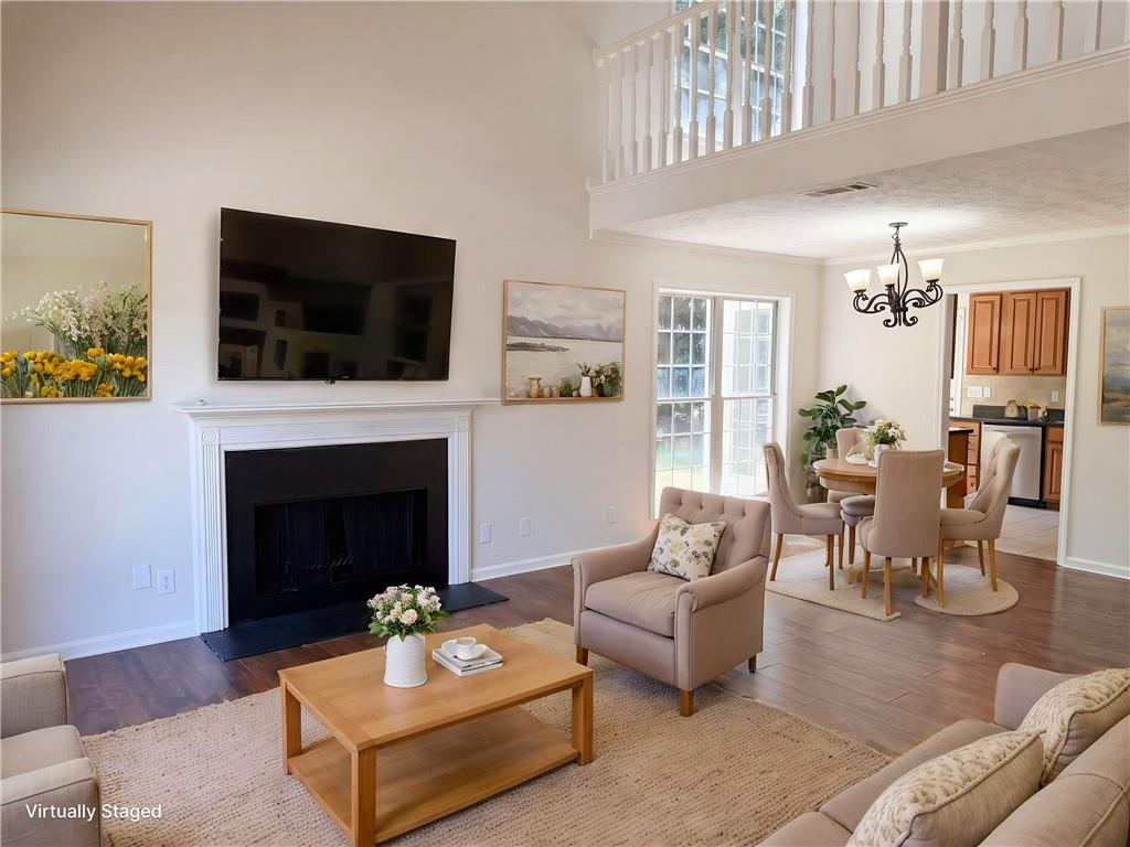 722 Ridgetop Road Bethlehem, GA 30620 - Photo 4 of 23 a living room with furniture fireplace and flat screen tv