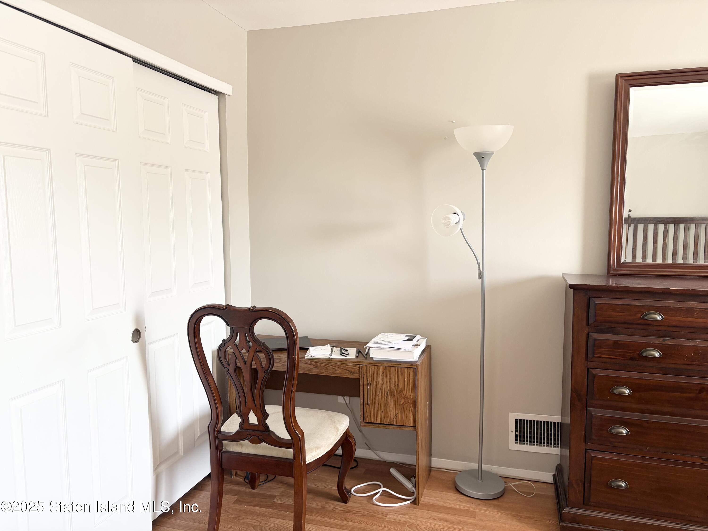 12 Delmar Avenue, Unit A Staten Island, NY 10312 - Photo 13 of 19 a view of a room with furniture and window