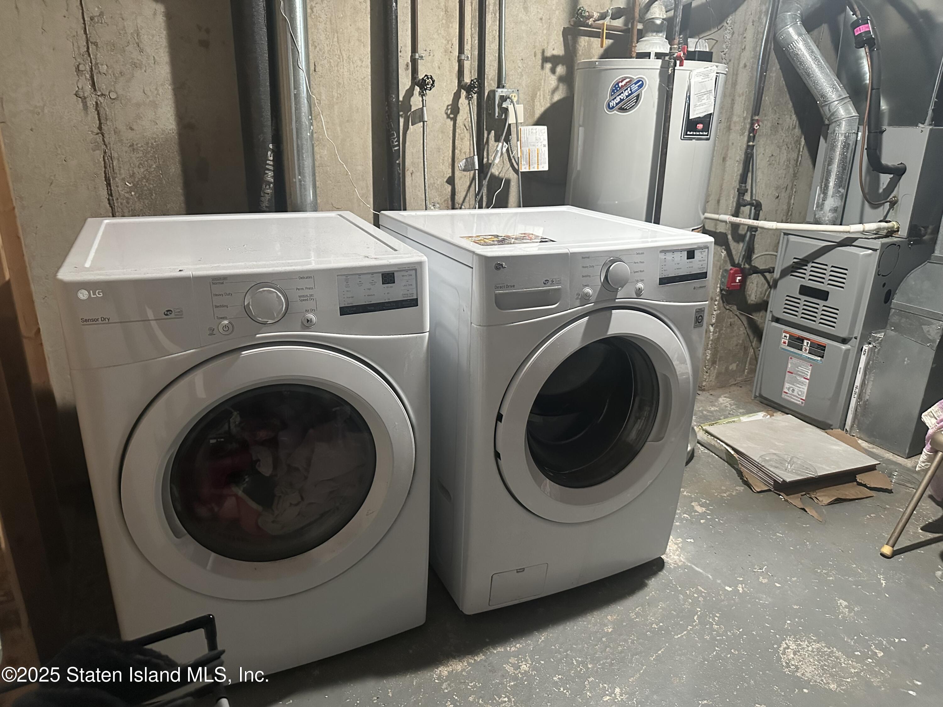 12 Delmar Avenue, Unit A Staten Island, NY 10312 - Photo 17 of 19 a utility room with dryer and washer