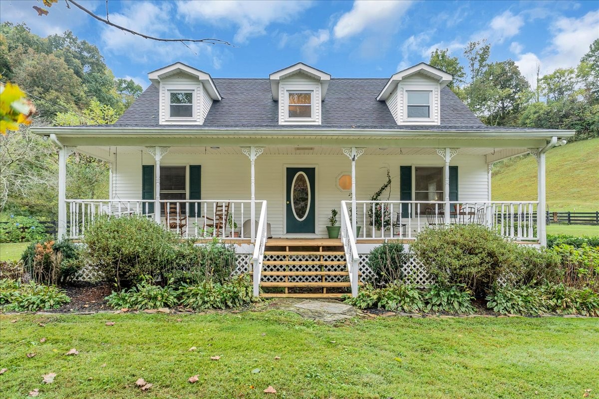 830 Bobo Hollow Road Lynchburg, TN 37352 - Photo 1 of 71 a front view of a house with a yard