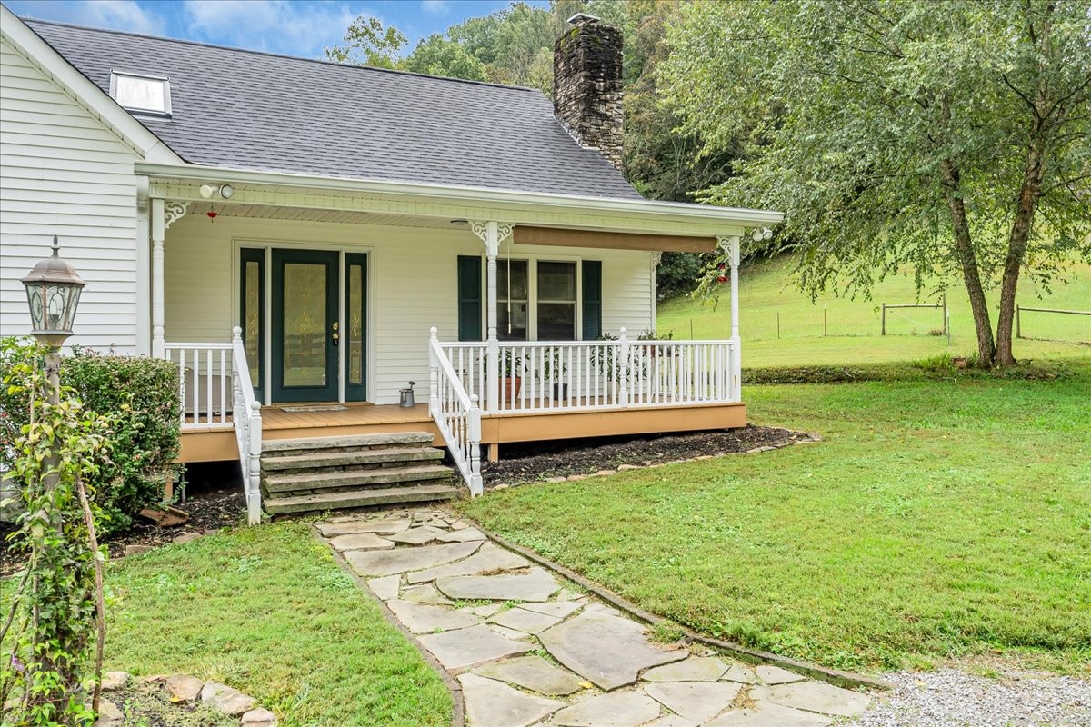 830 Bobo Hollow Road Lynchburg, TN 37352 - Photo 14 of 71 a view of a house with a yard