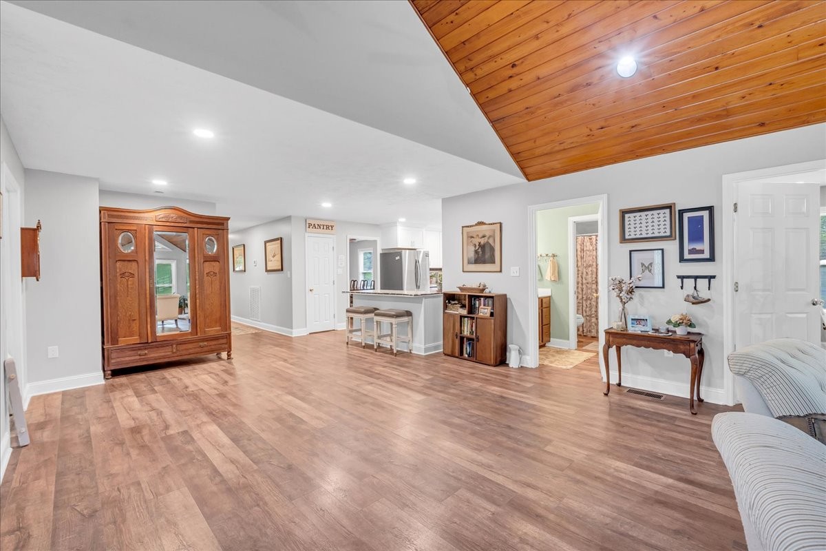 830 Bobo Hollow Road Lynchburg, TN 37352 - Photo 42 of 71 a view of a livingroom with furniture and wooden floor
