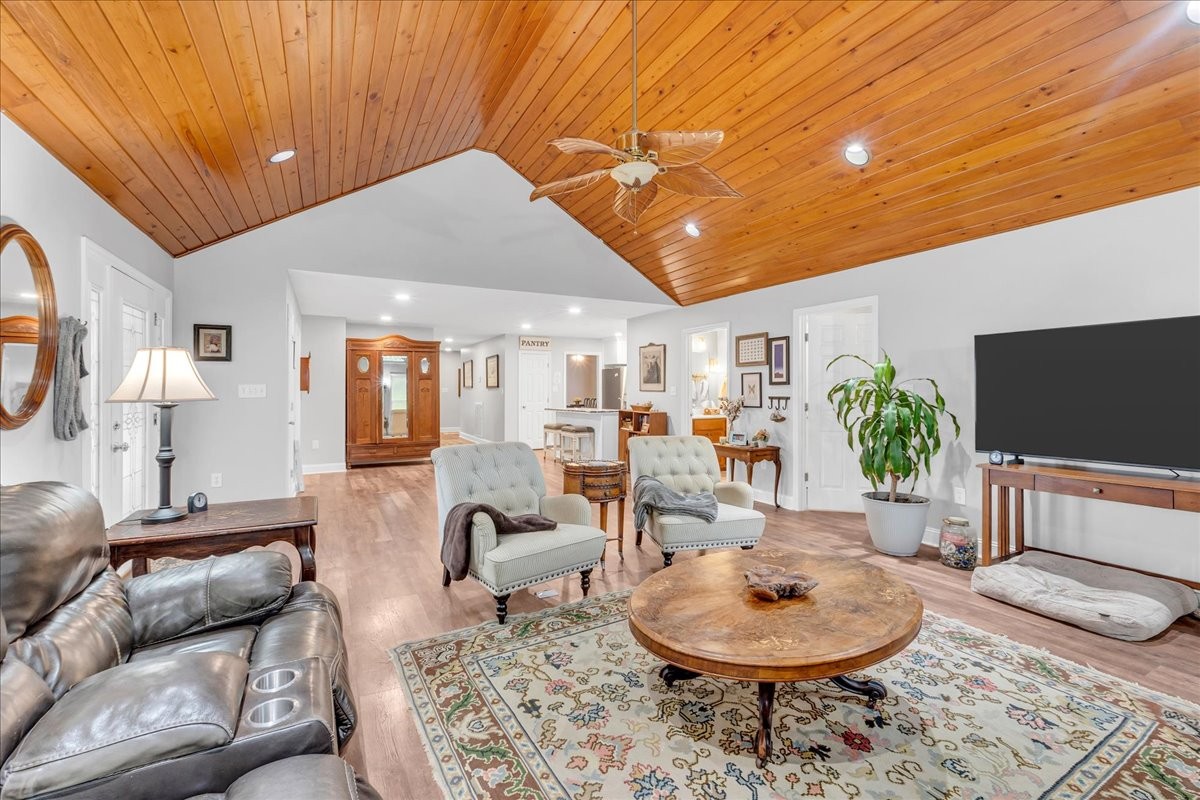 830 Bobo Hollow Road Lynchburg, TN 37352 - Photo 43 of 71 a living room with furniture and a flat screen tv